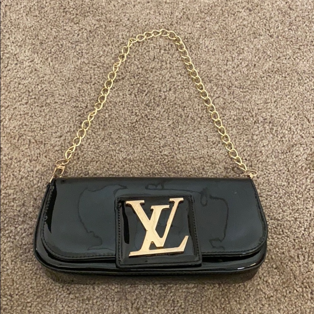 LV satchel/clutch with gold lettering